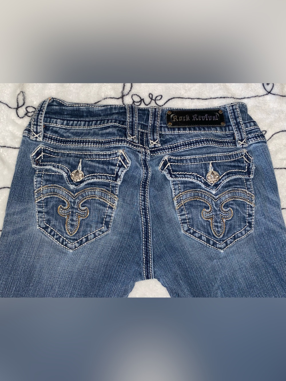 Rock Revival low rise Boot Cut Jeans with Embroidered Pocket Detail size 28